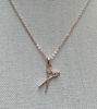 Picture of Elegant Rose Gold Bow Necklace – Dainty Ribbon Pendant with Sparkling Accents
